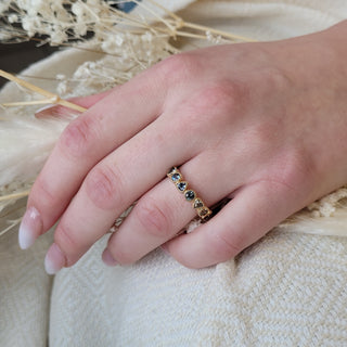 Trilliant and Round Teal Sapphire Band