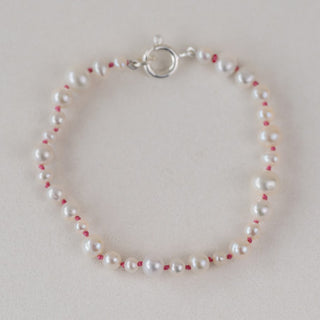 Mixed White Pearl Bracelet With Pink Cord