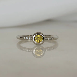 Yellow Sapphire And Diamond Ring