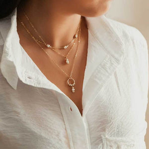 Strut Jewelry White Pearl Drop Necklace